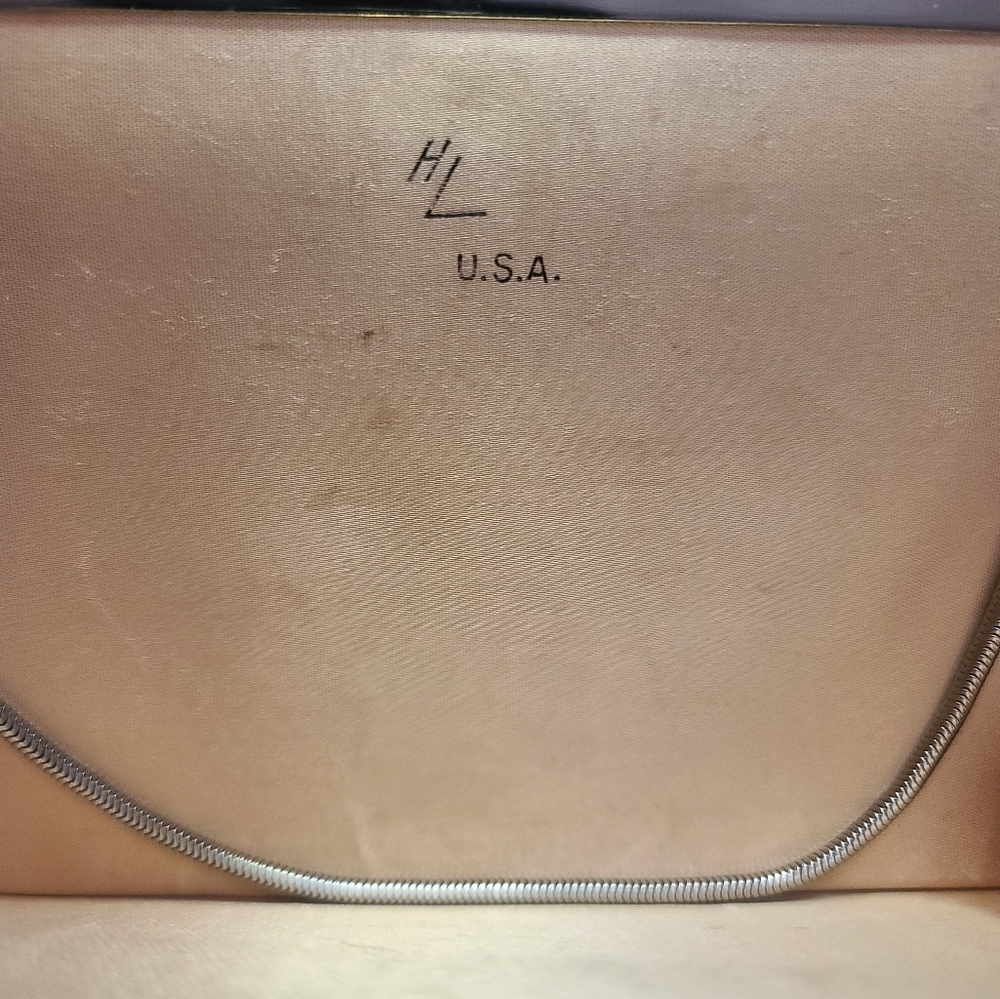 Harry Levine silver clutch purse